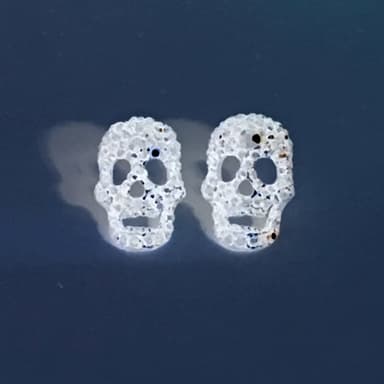 skull earrings profile